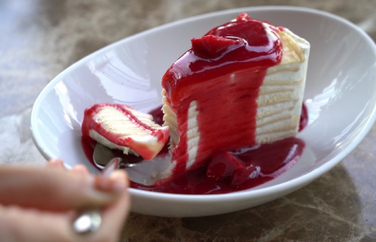 Warm and Yummy Vanilla Crepe Cake with Raspberry and Strawberry Sauce