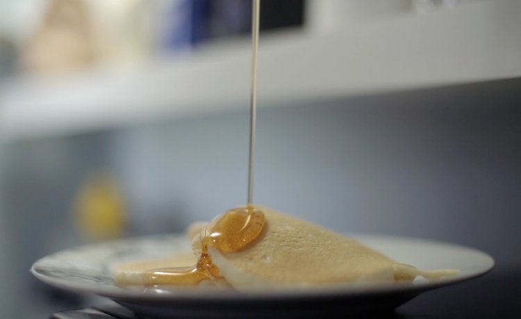 Elevated Breakfast: CBD-THC Infused Cannabis Oil Syrup Poured Over Pancakes