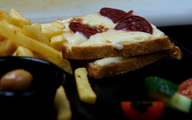 Savoring Delight: Toast Bread with Melted Cheese and Pepperoni