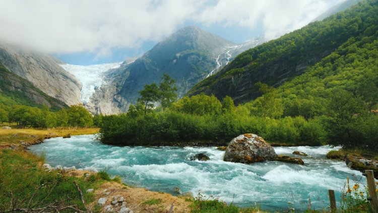 Majestic Beauty: Exploring Briksdal Glacier and Its Serene Mountain River