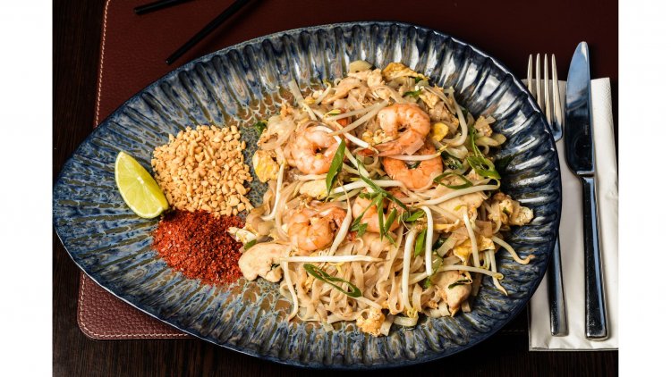 Dive Into the Delicious World of Pad Thai: Stir-Fried Noodles with Shrimp, Tofu, and Peanuts